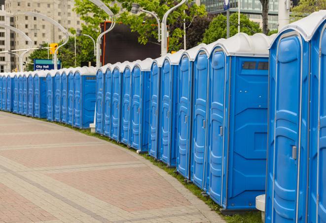 a row of sleek and modern portable restrooms at a special outdoor event in Dumfries, VA